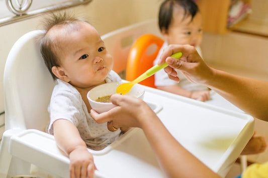 Babies on the chair with constipation remedy | Ziggy Bars