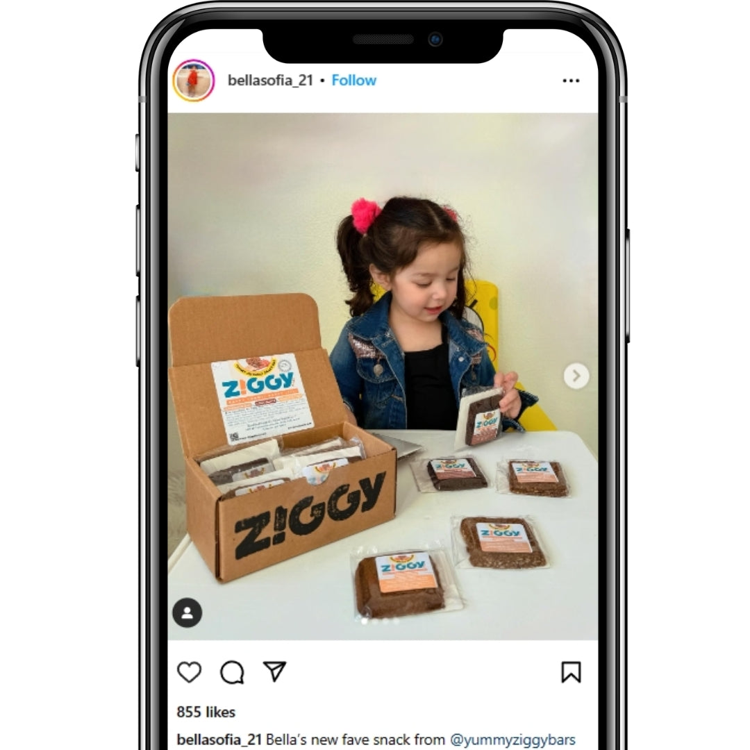 A girl holding snack bars from Instagram | Ziggy Bars